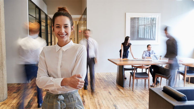Woman-smiling-in-office--1200x675