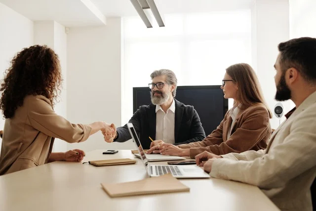 specialists-meeting-together-shaking-hands